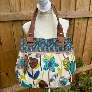 Fossil coated canvas large roomy shoulder bag in cream and blue.